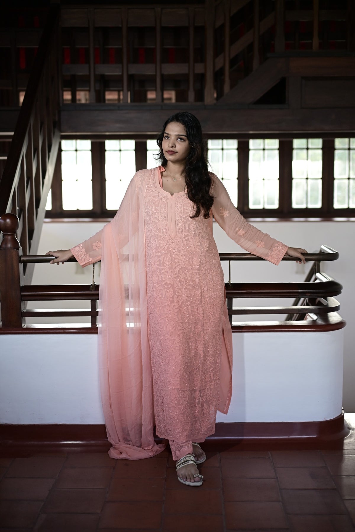 House of Murri kurtha editorial in a wood-panelled interior